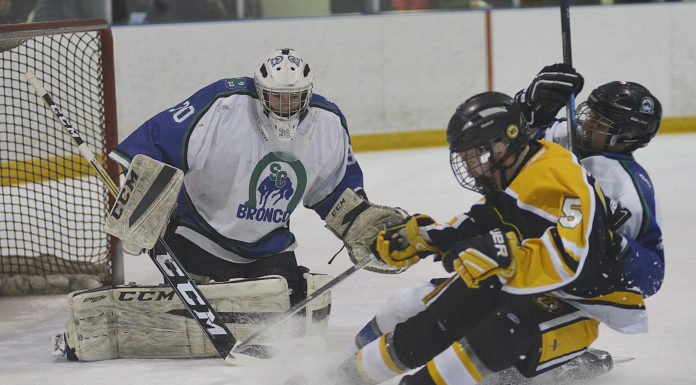 Midget AA Broncos win playoff opener