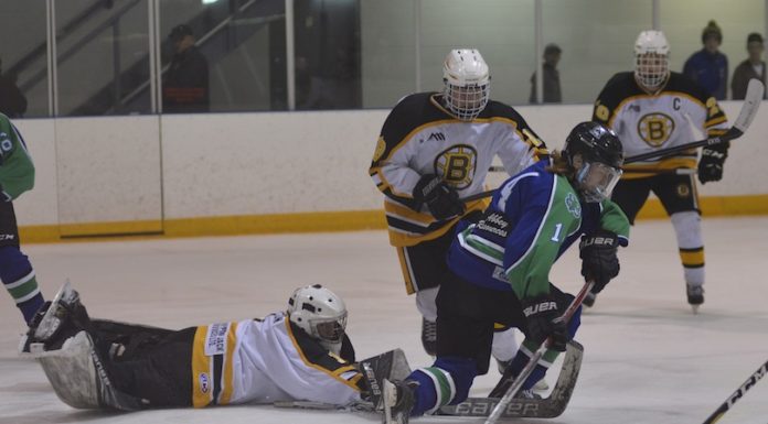 Midget AA Broncos advance with shutout win