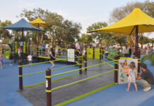Community gets first look at innovative inclusive park at grand opening Double-wide playground ramps offer inclusive play opportunities.