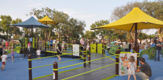 Double-wide playground ramps offer inclusive play opportunities.