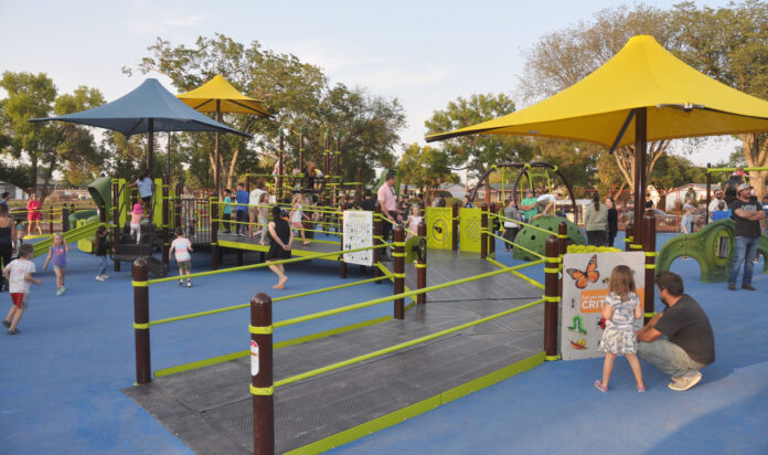 Double-wide playground ramps offer inclusive play opportunities.
